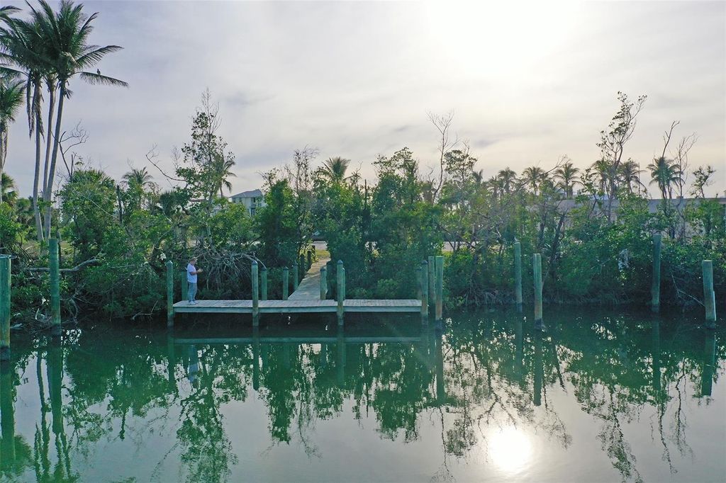 Photo of 8040 Bocilla Drive, Placida, FL 33946 (MLS # D6140903)