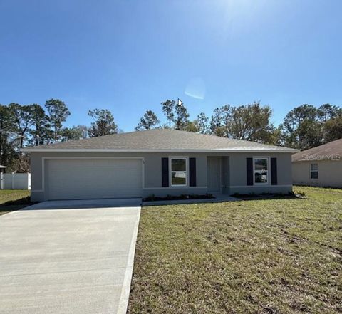Photo of 42 Peppercorn Lane, Palm Coast, FL 32164 (MLS # C7510472)