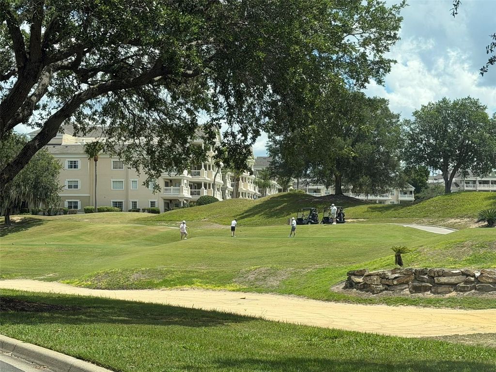 Photo of 7656 Whisper Way #401, Reunion, FL 34747 (MLS # O6396261)