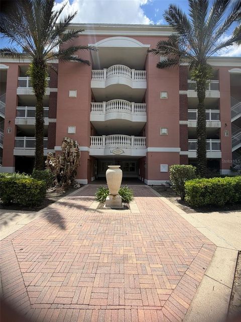 Photo of 7656 Whisper Way #401, Reunion, FL 34747 (MLS # O6396261)