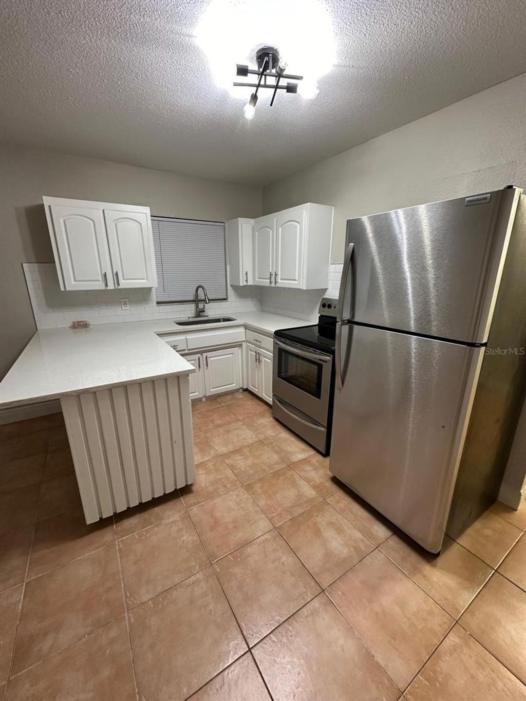 Photo of 3407 N Avenida Republica De Cuba St #A, Tampa, FL 33605 (MLS # O6371562)