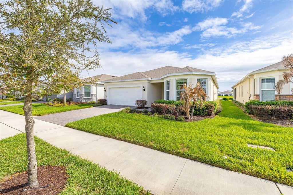 Photo of 6129 Blue Pond Way, Saint Cloud, FL 34771 (MLS # O6392129)
