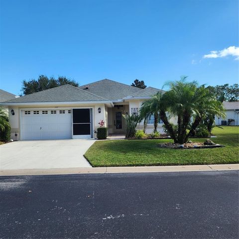 Photo of 107 Raintree Circle, Palm Coast, FL 32164 (MLS # FC313538)
