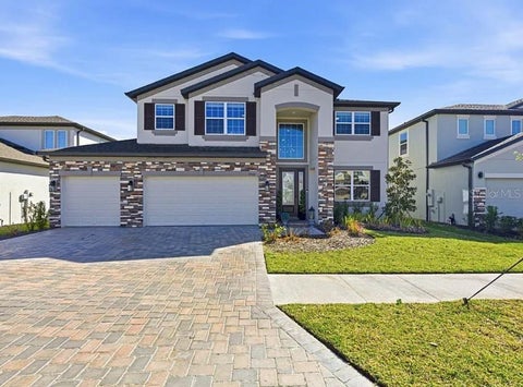 Photo of 9522 Seagrass Port Pass, Wesley Chapel, FL 33545 (MLS # J1004628)