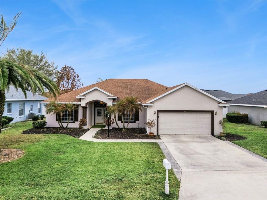 Situated in the desirable gated community of Terranova, this wonderful 3-bedroom, 2-bath pool home with a den offers comfort, and efficiency. Enjoy low energy costs thanks to the fully paid solar system, providing long-term savings and sustainability.

Upon arrival, you’re welcomed by a lovely covered entry accented with a leaded glass front door and arched transom window, filling the foyer with natural light. The spacious great room features hand-scraped engineered wood flooring and a large sliding glass door that seamlessly brings the outdoors in, offering views of the patio and pool area.

The well-appointed kitchen showcases white cabinetry with brushed nickel hardware, beautifully complemented by a glass tile backsplash. Stainless Steel Appliance Package includes a Gas Range. A granite-topped breakfast bar with pendant lighting provides additional seating and creates a natural gathering space. A formal dining room is conveniently located nearby, making entertaining effortless.

The primary bedroom suite offers a walk-in closet and a cozy sitting niche—ideal for relaxing while enjoying views of the pool. The primary bathroom is thoughtfully designed with dual sinks, a linen closet, walk-in shower, private water closet, and a luxurious garden tub.

Step outside to your private outdoor oasis. The lagoon-style pool with a cascading waterfall creates a tranquil ambiance, while the covered patio provides shade from the Florida sun and convenient access to the guest bath—perfect for poolside gatherings. A fully fenced yard ensures privacy and features an avocado and citrus trees.

Additional Features: Den/office, Laundry room with washer and dryer, Solid surface flooring throughout, Water heater (2020), Architectural shingle roof (2020), 18 SEER Carrier HVAC system with heat pump (2020) and warranty, In-wall pest control system, Pull-down attic stairs, Irrigation well, Smart lock entry, Child safety fence for pool, Exterior carriage lighting, Oversized driveway, Two-car garage with door opener and keyless entry panel.
This fabulous home is conveniently located in a picturesque gated community near schools, shopping, restaurants, and Legoland, offering the perfect blend of luxury, convenience, and energy efficiency.