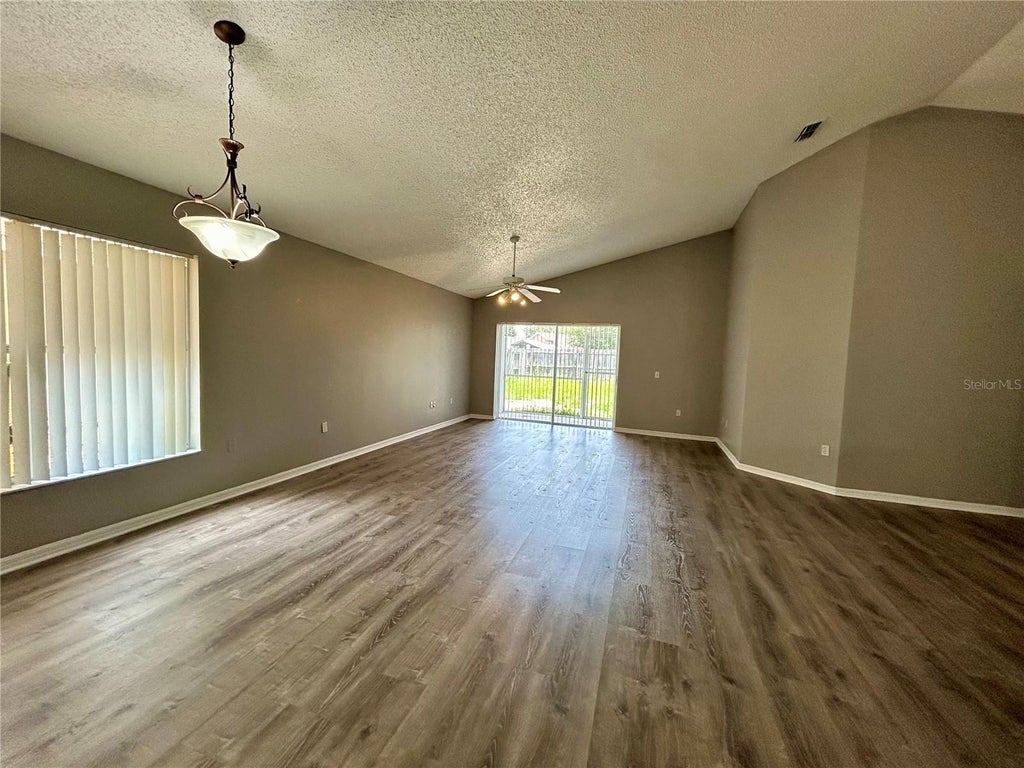 Photo of 138 Sir Phillips Drive, Davenport, FL 33837 (MLS # O6444462)