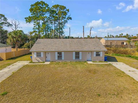 Photo of 1930 Fern Palm Drive, Edgewater, FL 32141 (MLS # NS1087514)