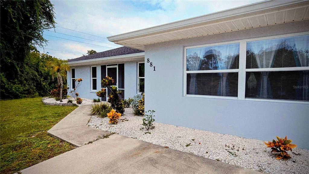 Photo of 881 Bayshore Drive, Englewood, FL 34223 (MLS # S5135274)