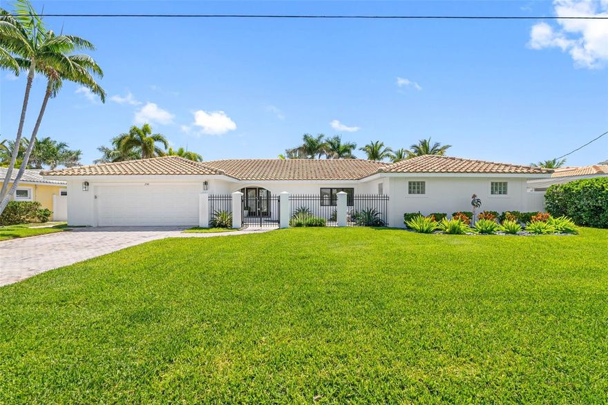 It is a rare opportunity to own a piece of paradise. Your open-water view updates every minute with the boat and dolphin show streaming along the Pass-a-Grille channel. Sunrise views throughout are the perfect way to start your day, every day. At 2741 (Pura) Vina, you are set apart from the hustle of the beach on the tranquil island of Vina Del Mar, yet a short golf cart ride to the best beach in the United States (Trip Advisor 2021). This single-floor, three-bed, four-full-bath home has a view from every angle. It features a split floor plan, so your guests and family have their own space, while you will enjoy a huge master suite with an adjoining office. Featuring two walk-in closets, a gas fireplace, and a generous master bath with a walk-in shower and spa tub, you may never want to leave your private sanctuary. The problem is that the guest area accommodations are so inviting that they may not want to leave either! The outside...a sprawling patio with a pool, 98' of waterfront, and mature palms whispering in the constant breeze is a tropical resort. If only someone else was cooking in that new (2022) outdoor kitchen! Walk out to the dock (2023), hop in the boat (10k lift), hang a right, and you'll be in the Gulf in minutes. Tarpon dance May and June, or try to hook one of the snook lounging in the shade under your dock. Pass-a-Grille is truly a local favorite, and when you turn left at the iconic Don Cesar, you will see why. It's old Florida at its finest. We can't wait to show you Pura Vina, you are sure to fall in love! Showings by appointment only.