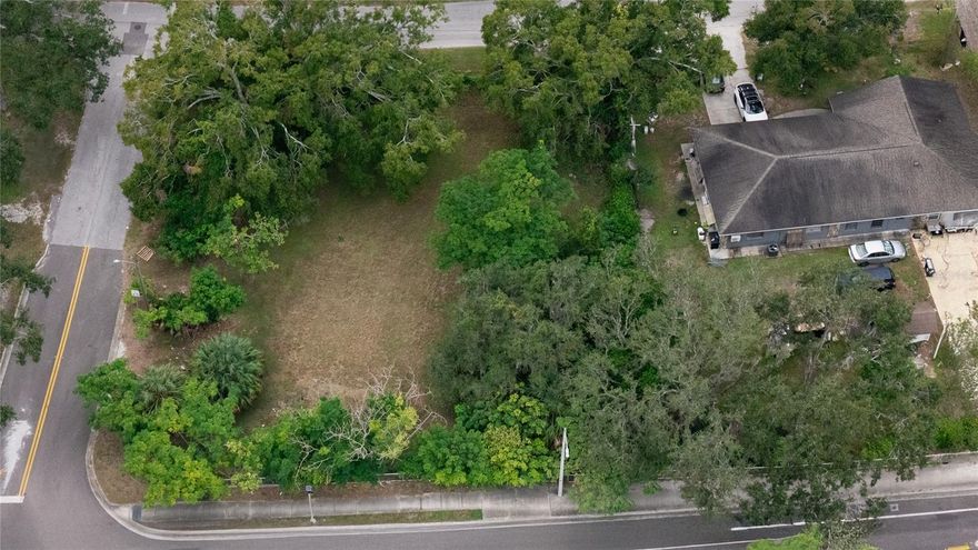 Investor & Builder Special! Rare opportunity to own a massive 13,888 sq ft lot zoned RM-24 in the heart of Tampa's growing Temple Crest neighborhood. This oversized residential lot is ready for development—perfect for multifamily units, duplexes, or townhomes in a centrally located area with easy access to I-275, Busch Gardens, USF, and Downtown Tampa. Zoning RM-24 allows for up to 24 units per acre, meaning 5-6 units are possible on this site. Two professionally prepared site plans showing 5 and 6 unit configurations are available and upon request. These plans can offer a valuable head start for development ideas and feasibility review. Seller makes no representations as to approvals—buyer to verify all zoning and permitting requirements. The lot is situated in an established residential community and offers paved road access, close proximity to utilities, and strong comp support from nearby lots.