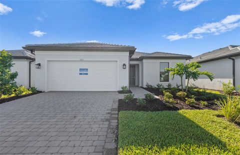 Photo of 1925 Pepper Grass Drive, North Port, FL 34289 (MLS # TB8378894)