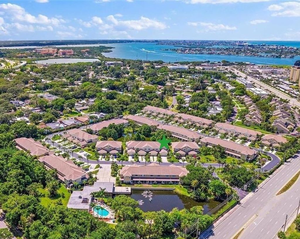 Photo of 11117 Kapok Grand Circle, Madeira Beach, FL 33708 (MLS # TB8463217)