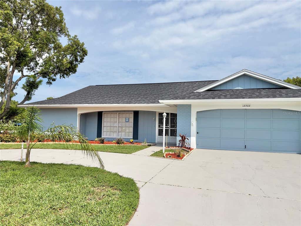 Photo of 12302 Fieldstone Lane, Hudson, FL 34667 (MLS # W7888138)