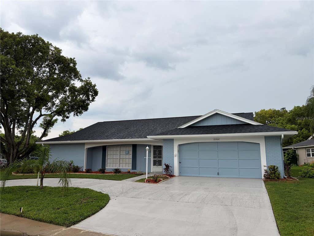 Photo of 12302 Fieldstone Lane, Hudson, FL 34667 (MLS # W7888138)