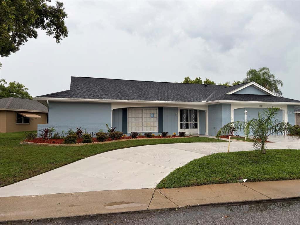 Photo of 12302 Fieldstone Lane, Hudson, FL 34667 (MLS # W7888138)