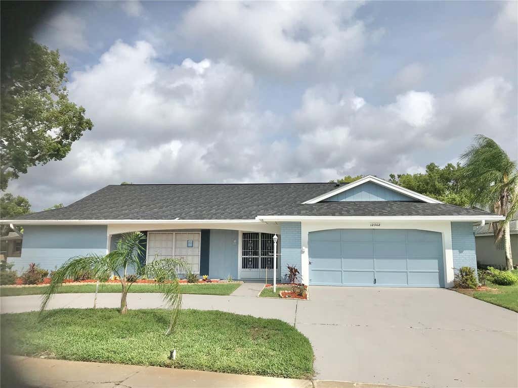 Photo of 12302 Fieldstone Lane, Hudson, FL 34667 (MLS # W7888138)