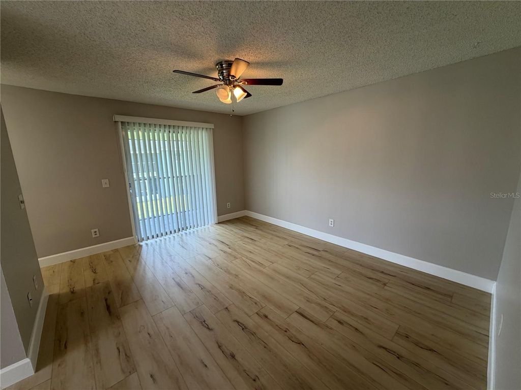Photo of 4160 Pershing Pointe Place #3, Orlando, FL 32822 (MLS # O6424269)