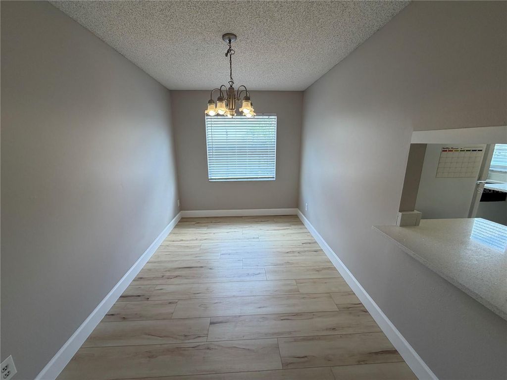 Photo of 4160 Pershing Pointe Place #3, Orlando, FL 32822 (MLS # O6424269)