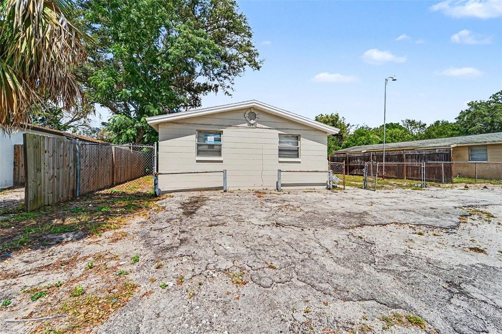 Photo of 10112 N Lantana Avenue, Tampa, FL 33612 (MLS # O6409018)