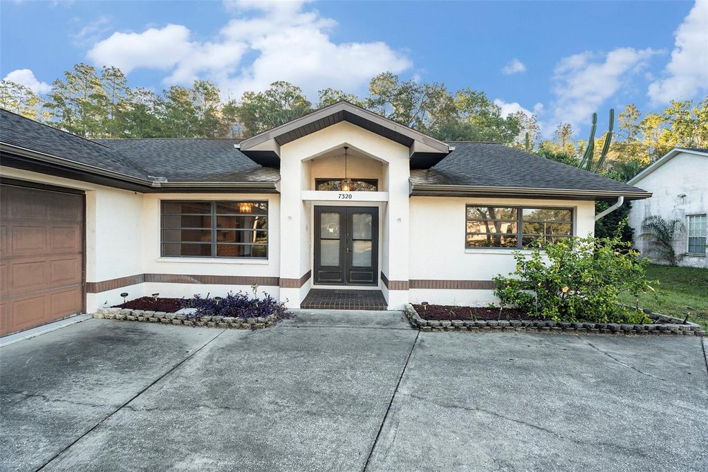 Photo of 7320 Auburn Lane, New Port Richey, FL 34654 (MLS # O6353192)