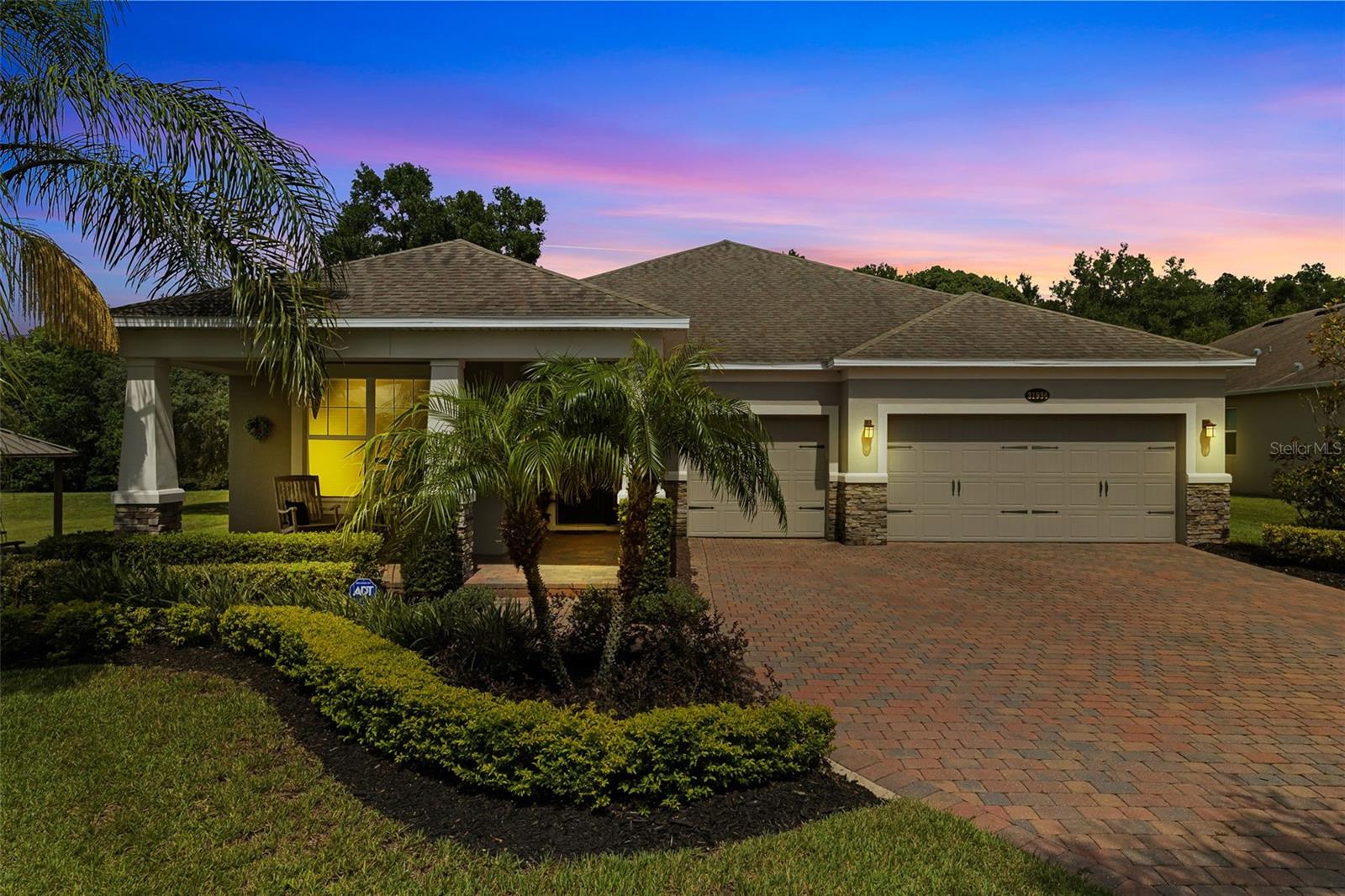 Welcome home to this impeccably maintained four bedroom three bath home with one of the best views in the neighborhood. It overlooks red tails 16th hole and water view. The beautiful craftsman home has a welcoming front porch with two rocking chairs. When you walk into the home on the left, there are two secondary bedrooms. On the right is the door accessing the large three car garage. As you continue in the home it opens to the gourmet kitchen with all the bells and whistles you'd expect in a home of this caliber. To the right is where you can access the three car garage. As you continue, it opens to the gourmet kitchen with all the bells and whistles you'd expect in a home of this caliber. Granite counters, stainless steel appliances, and a huge island that easily accommodates three barstools. It has a combination family room, dining room and sliding doors that open to the lanai where you can take in the spectacular view of the 16th hole as sandhill cranes and various species of birds descend on expansive wetland Waterview. To the right is another wetland. To the right is another secondary bedroom, making this a three-way split with the master in the rear of the home viewing the conservation area. The home sits on almost a half acre of land so you don't feel on top of your neighbor and there's plenty of room for a pool if you desire. Schedule your private showing today because it will undoubtedly be under contract within a couple days since it's attractively at $595,000.
