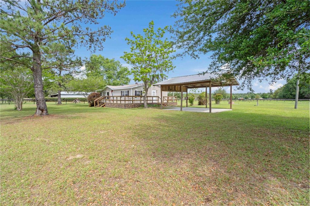 Photo of 14491 SE 68th Lane, Morriston, FL 32668 (MLS # OM722652)