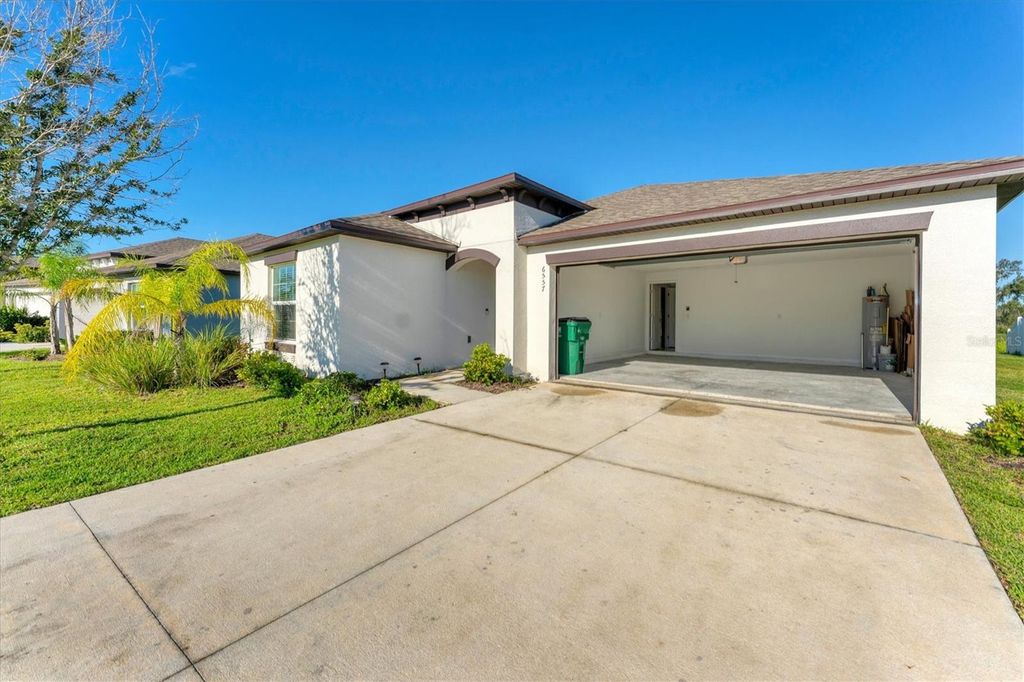 Photo of 6557 Bar S Bar Trail, Zephyrhills, FL 33541 (MLS # TB8432037)
