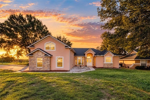 Photo of 14028 Vista Del Lago Boulevard, Clermont, FL 34711 (MLS # O6452422)