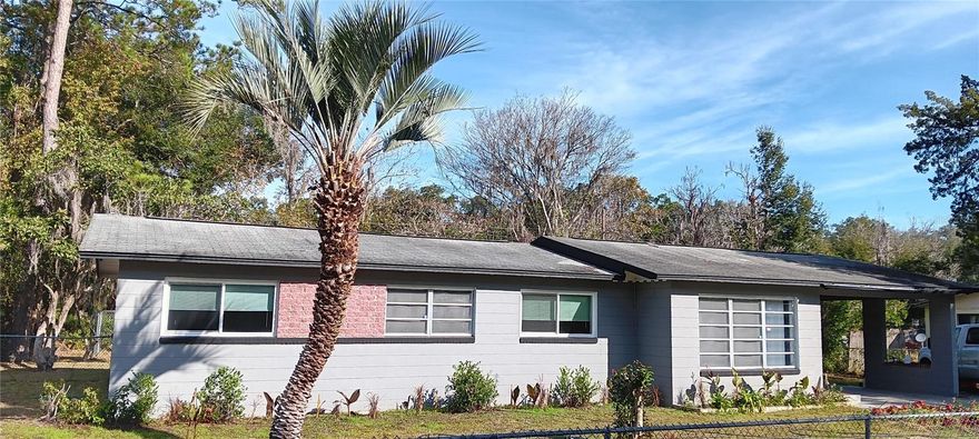 Lushly Landscaped-Too Many Amenities to mention!  This 4 bedroom, 3 bath home has a kennel, man cave, tool shed, separate fenced front and backyard. A huge  living room welcomes your arrival, a glance to your right reveals an additional 16 x 15 den with it's own half bath and an egress to the meticulously maintained backyard. The VA, Shands, UF, and downtown Gainesville are less than 4 miles away and can be reached via the Gainesville-Hawthorne trail.