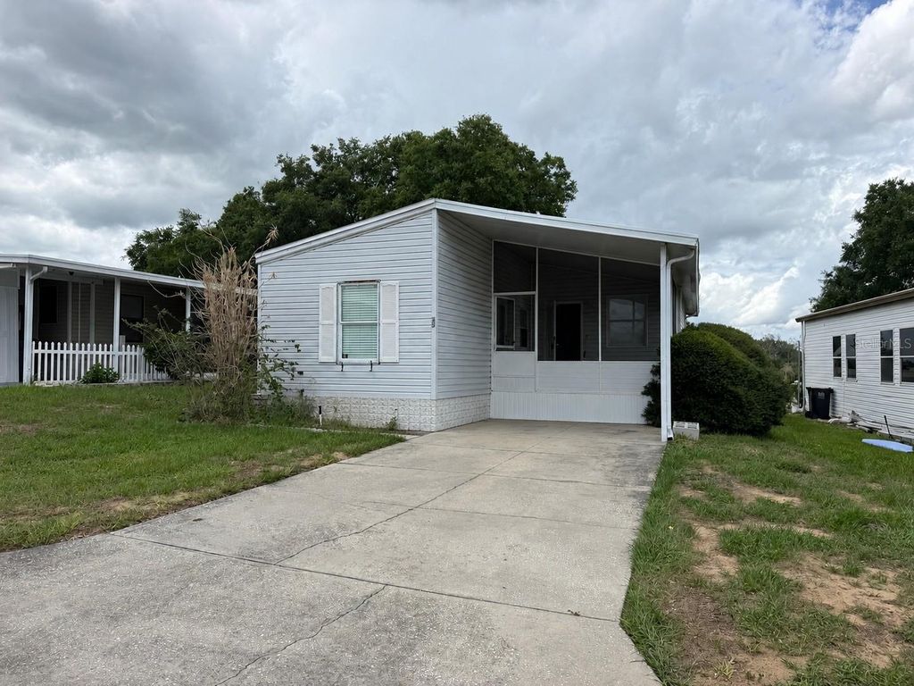 Photo of 50989 Highway 27 #33, Davenport, FL 33897 (MLS # O6412019)
