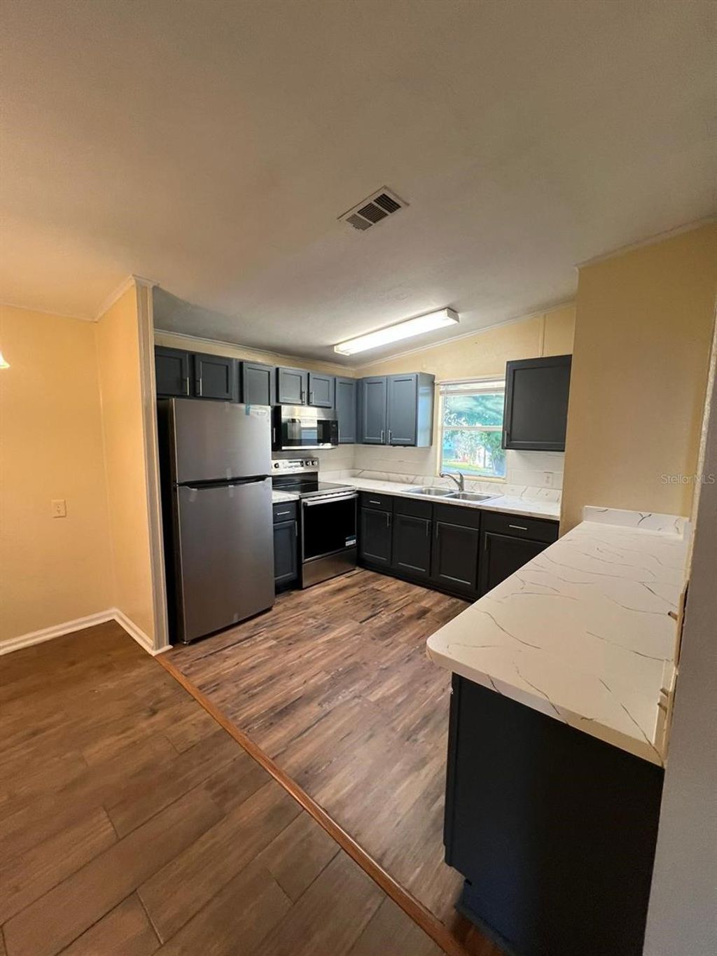 Photo of 50989 Highway 27 #33, Davenport, FL 33897 (MLS # O6412019)