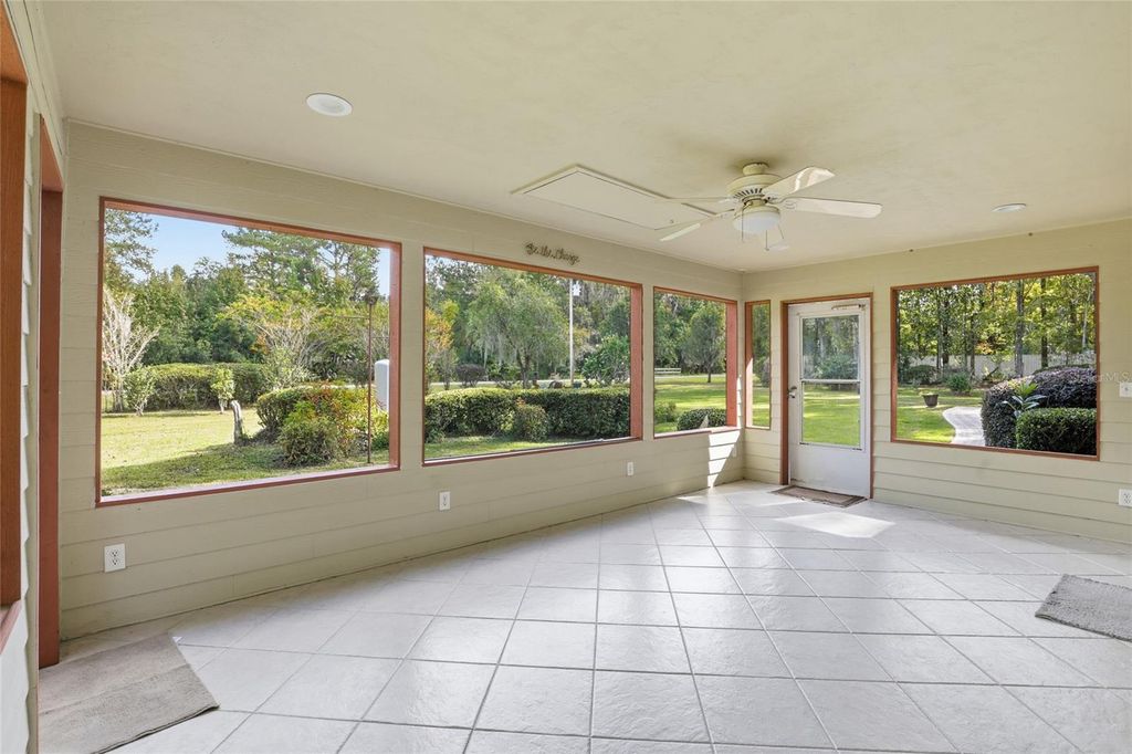 Photo of 24214 NW 52nd Terrace, Alachua, FL 32615 (MLS # GC535369)