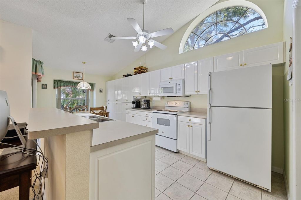 Photo of 3087 Pepperwood Lane W, Clearwater, FL 33761 (MLS # TB8474036)