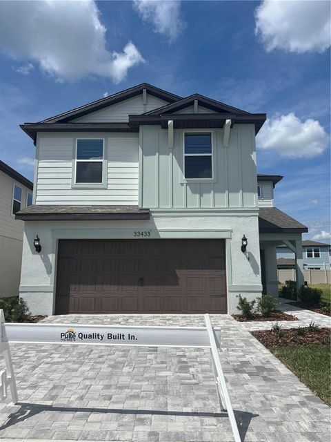 Photo of 33433 Binding Ties Lane, Wesley Chapel, FL 33545 (MLS # J1000985)