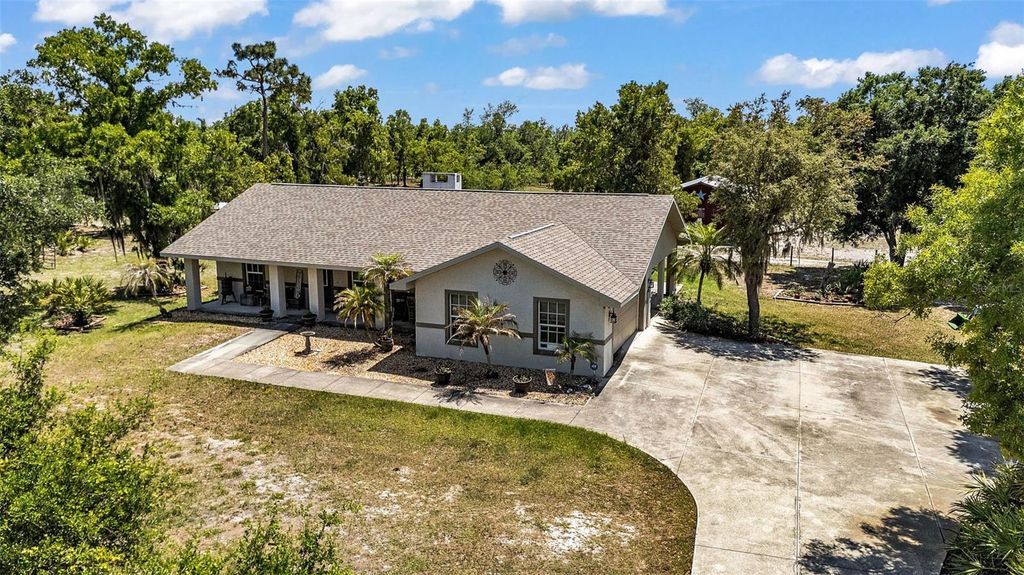 Photo of 31331 Washington Loop Road, Punta Gorda, FL 33982 (MLS # C7524921)