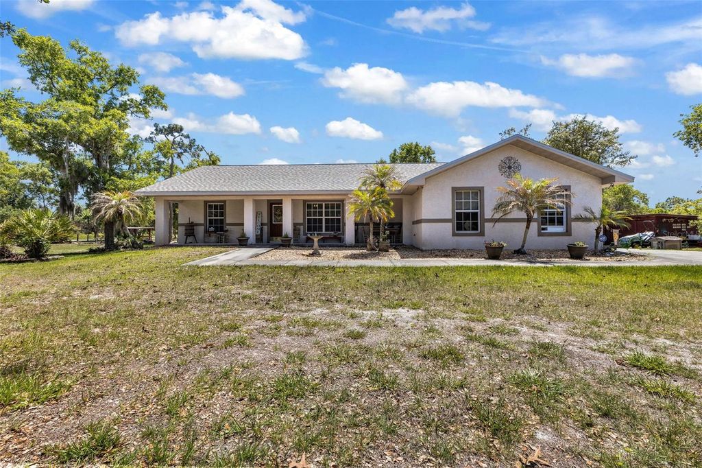 Photo of 31331 Washington Loop Road, Punta Gorda, FL 33982 (MLS # C7524921)