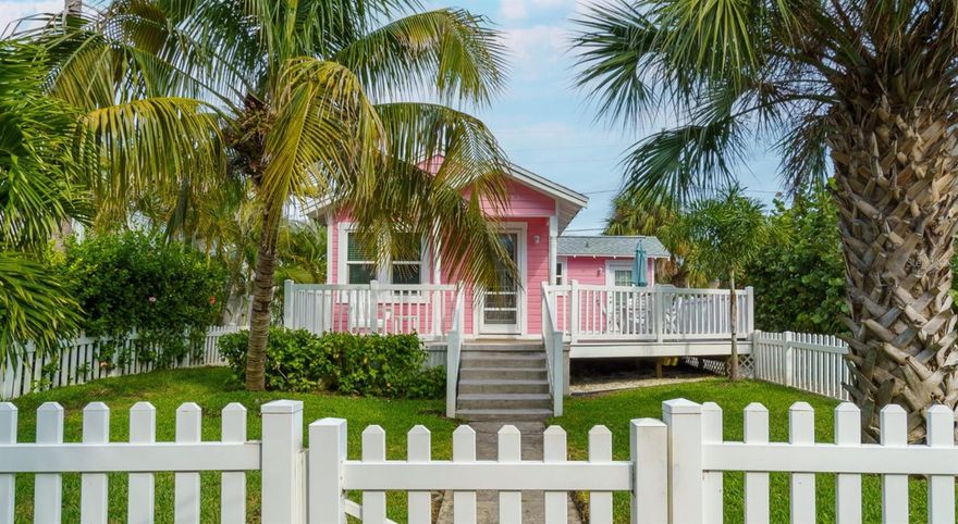 Charming Gulf-Side Income Property Just Steps to the Beach. Exceptional opportunity to own a fully renovated (2022 -2023) light-filled 1938 bungalow located just approximately 30 steps from the pristine shores of Sunshine Beach. Nestled among palm trees on the gulf side of Gulf Boulevard on desirable Treasure Island near John’s Pass this one-of-a-kind property offers timeless costal charm paired with modern updates.
This is a proven income-producing property, generating over $100,000 in bookings in 2025, making it ideal for investors or buyers seeking a
beach retreat with strong rental history. Enjoy a truly effortless beach lifestyle with no busy streets to cross. Simply step out to the back door and access the beach via two conveniently located boardwalks, one on either side of the property. After a day in the sun and surf, unwind on the private deck while listening to the waves, surrounded by lush tropical landscaping. The deck overlooks a privately fenced lawn with colorful hibiscus and mature palm trees, creating a peaceful outdoor oasis. Inside, the bungalow boasts one bedroom and one bathroom, along with an expansive light-filled living area. With the bedroom plus two full-size pullout sofas in the living area, the home comfortably sleeps 3-6 guests. The recent renovation thoughtfully preserves original character while incorporating modern finishes and updated amenities designed for comfortable living and rental performance. A rare gulf-side offering with documented income, recent renovation, and unbeatable walk-to-beach access in one of Treasure Island’s most desired locations.