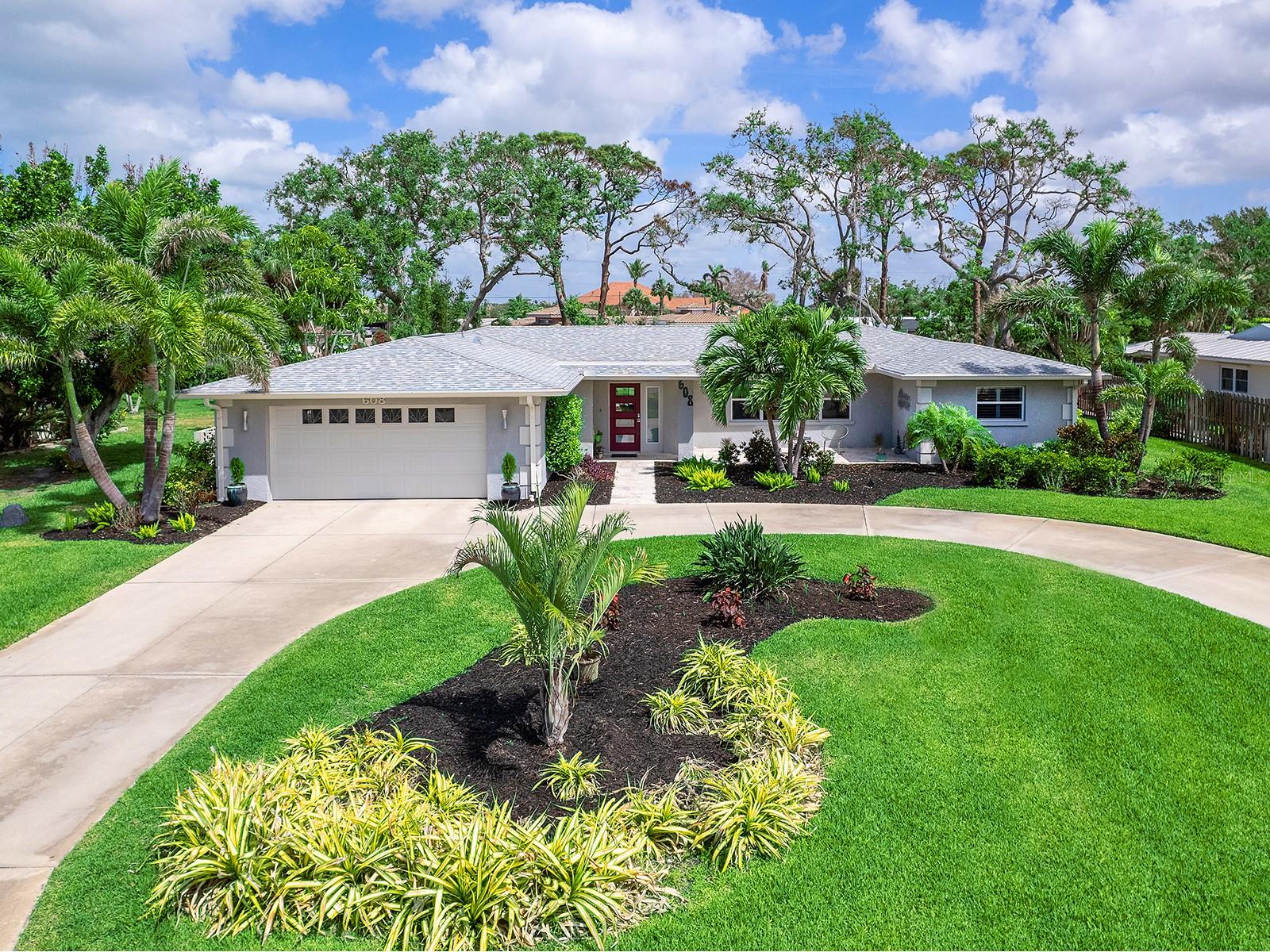 On nearly half an acre on Venice Island, just blocks from Venice Beach and historic downtown, this home embodies coastal living and contemporary design. Extensively remodeled in 2017, it welcomes you with vaulted ceilings and expansive sliding glass doors that flood the great room with natural light. The open, upgraded kitchen boasts elegant bamboo cabinetry, refined granite countertops and modern dark stainless steel KitchenAid appliances, to include a KitchenAid oven with gas range. The three baths have been updated to embrace a chic, coastal-inspired aesthetic and are enhanced by comfort of heated tile floors. Throughout the rest of the home, its timeless appeal is further accentuated by beautifully refinished terrazzo floors. Recent upgrades, including a new electrical panel in 2025, new roof in 2021 and whole home replumbing with new exterior drainpipes in 2017, ensure peace of mind. Outdoors, the expansive lanai and sparkling heated pool are complemented by a lushly landscaped backyard complete with a storage shed, creating an inviting outdoor space for entertaining or relaxing. To fully appreciate all this home has to offer, please be sure to request the full list of features and upgrades.