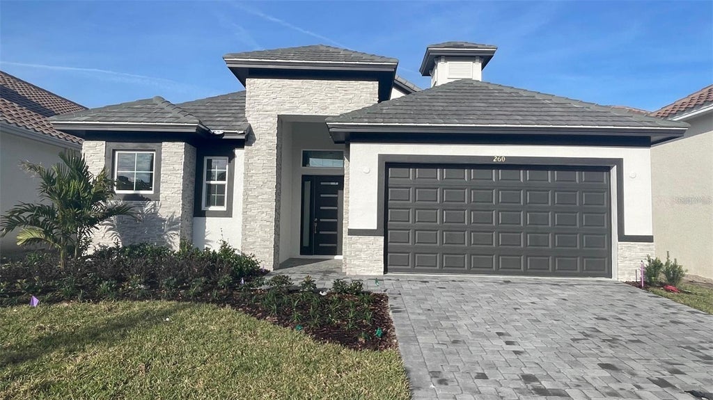 Photo of 260 Hampton Loop, Davenport, FL 33837 (MLS # S5152113)