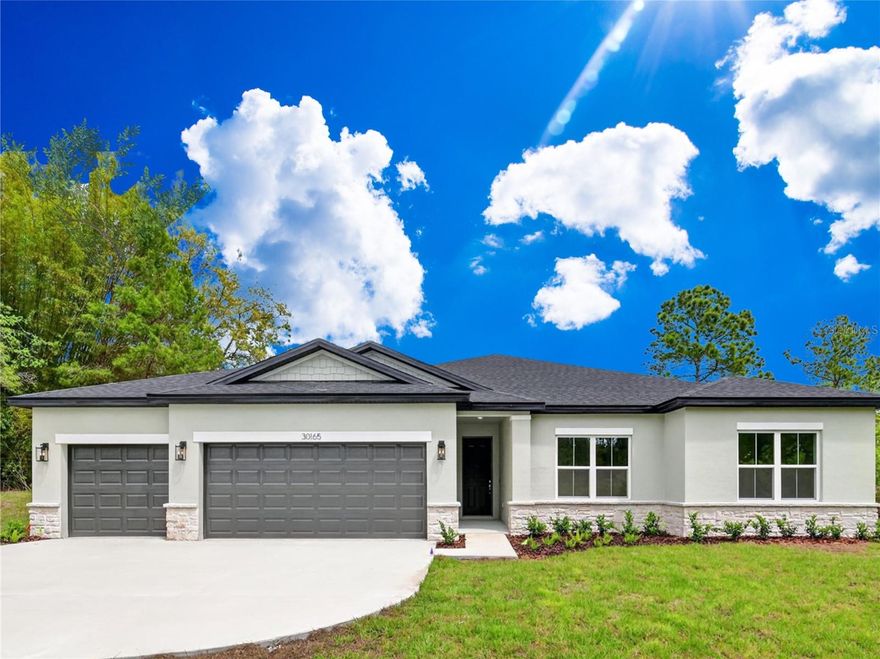 New construction on 1 acre! This beautifully designed 2,092 sq. floor plan offers 4 bedrooms, 3 full bathrooms, and a 3-car garage, providing space, comfort, and flexibility for a variety of lifestyles. The open concept kitchen, dining, and great room create a bright and inviting living area, featuring granite countertops, shaker cabinets, tile backsplash, LVP flooring, and a full Samsung stainless appliance package. The private primary suite is a true retreat with dual walk-in closets and a stylish bath highlighted by floor to ceiling tile and a glass enclosed shower. Secondary bedrooms are generously sized, offering options for guests, home office, or multigenerational living. Enjoy outdoor living on the covered lanai, perfect for relaxing or entertaining. Additional features include MI vinyl windows, recessed lighting, 6’8” interior doors, a 15 SEER2 Trane A/C, R 30 insulation, Honeywell programmable thermostat, washer & dryer included. Thoughtfully built, energy efficient, and move in ready on a spacious homesite—this home offers outstanding value and modern comfort. Wired Ring Smart Doorbell w/ plug in chime. The community has many miles of paved roads to jog, bike ride or drive your golf carts. The HOA is $92 a Year and it offers deeded access to Lake Norris of Maggie Jones Road and Lake Marion within the community. “Seller may consider concessions with an acceptable offer. A preferred local lender is available for buyer convenience; use of this lender is not required”  "SURVEY AVAILABLE"