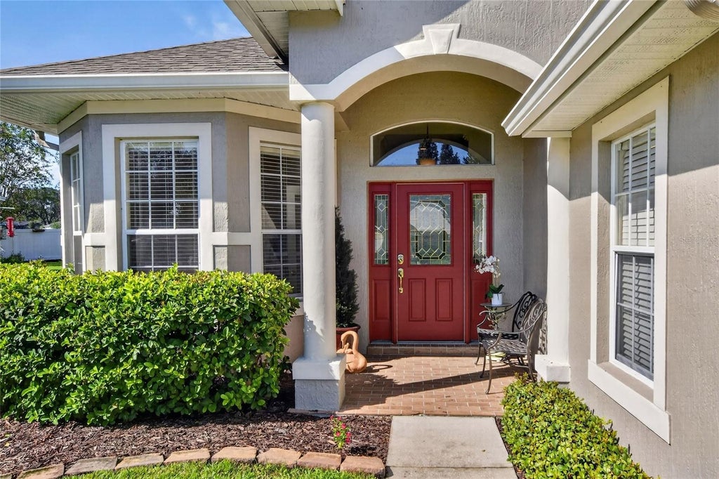 Photo of 1668 Rocky Pointe Drive, Lakeland, FL 33813 (MLS # O6440777)