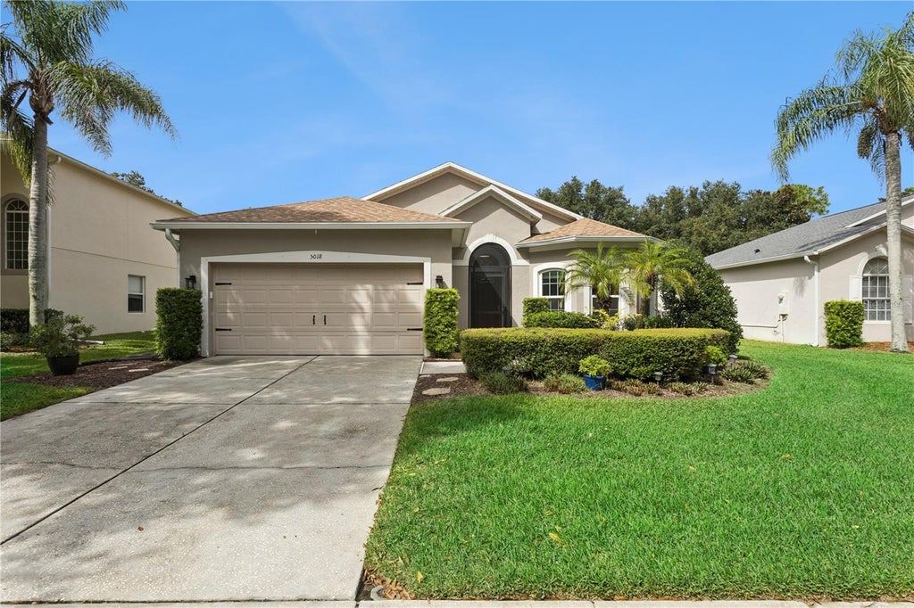 Photo of 5018 Tempic Drive, Mount Dora, FL 32757 (MLS # O6447778)