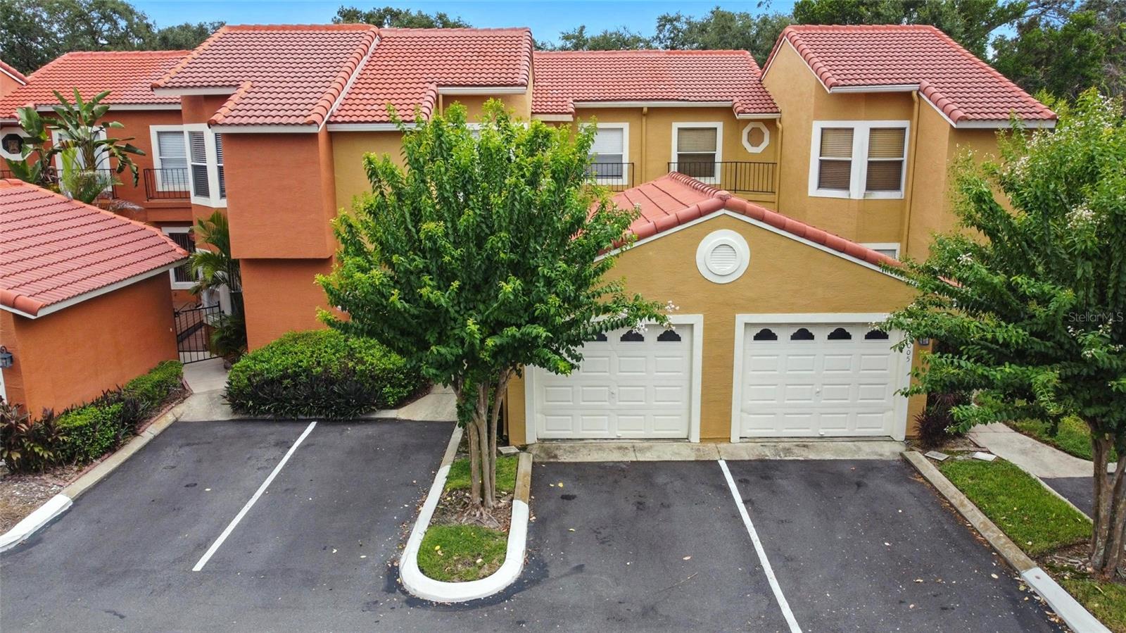Spacious 3-bedroom, 2-bath townhome in the gated community of St. Tropez. The first floor features a primary suite with walk-in closet, open living and dining areas with soaring ceilings, and a kitchen with stainless steel appliances and tile flooring. Upstairs offers a second possible primary suite with walk-in closet, a third bedroom, full bath, and a loft perfect for an office or extra living space. French doors open to a private screened patio, ideal for relaxing or entertaining. Recent updates include a new roof, newer AC, plumbing, and electrical. The community offers a serene pool and is conveniently located near Altamonte Springs, Longwood, I-4, and the 414.