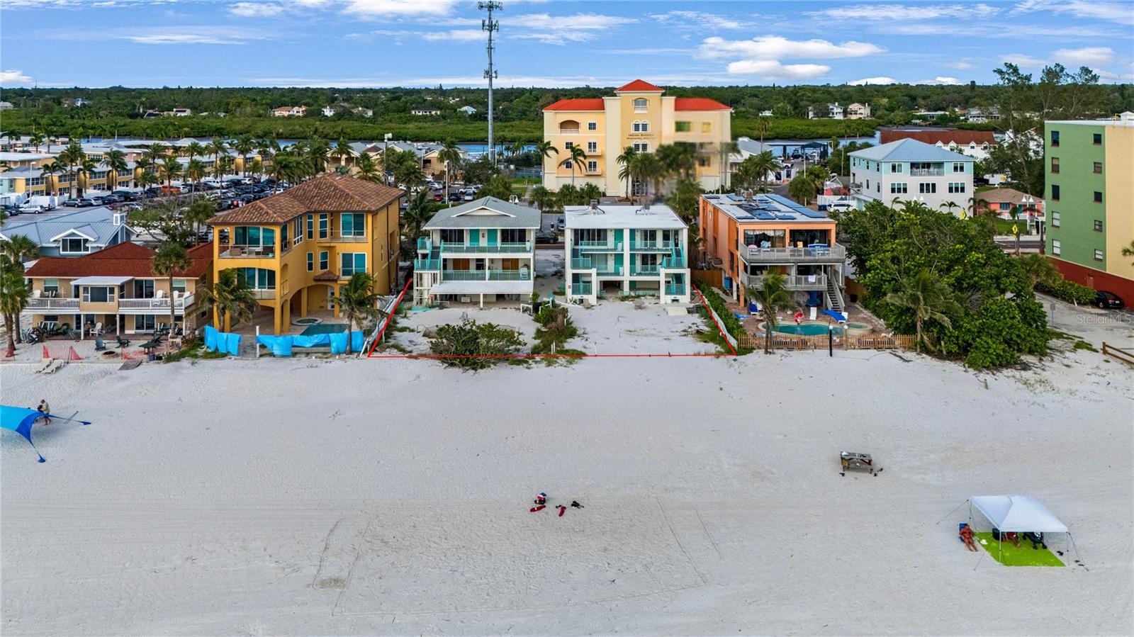 100 feet of Gulf frontage!!! Remodel or rebuild!! Both properties have water damage. 19310 Gulf Blvd zoned hotel/motel consists of FIVE Gulf front villas nestled in the heart of Indian Shores, Florida – a quaint coastal town located a few miles south of Clearwater Beach and just 30 minutes from Tampa International Airport. Properties have been used as vacation rentals. There are two 1 bedroom villas located on the top floor, offering spectacular views. The 3 bedroom, 2 bath villa encompasses the entire 2nd floor, featuring a master suite and main living area with stunning views of the Gulf. This villa offers a 36x11 covered terrace overlooking the white sands of Indian Shores. There is also a 2 bedroom villa or two 1 bedroom villas with options located on the lower level with easy access to the beach. The entire property offers a maximum occupancy of 22 guests. 19306 Gulf Blvd is zoned condominium. The property was used for seasonal vacation rentals.
