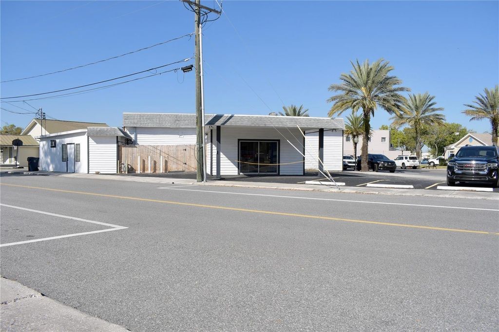 Photo of 212 Main Street, Auburndale, FL 33823 (MLS # S5146210)