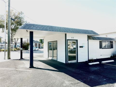 Photo of 212 Main Street, Auburndale, FL 33823 (MLS # S5146210)