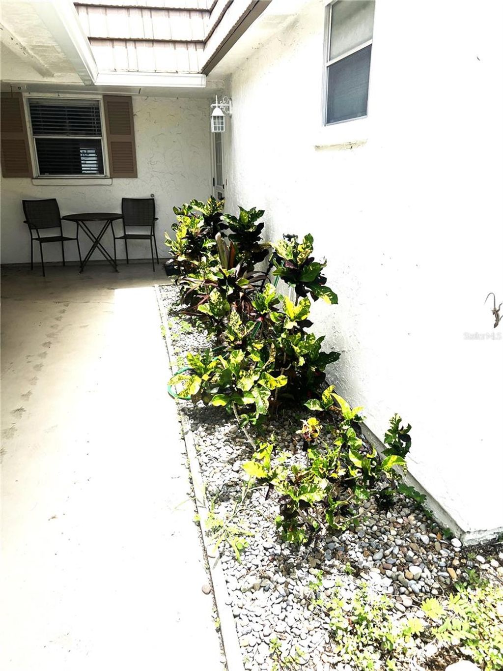 Photo of 2311 Waterbluff Pl #V307, Sarasota, FL 34231 (MLS # A4657658)