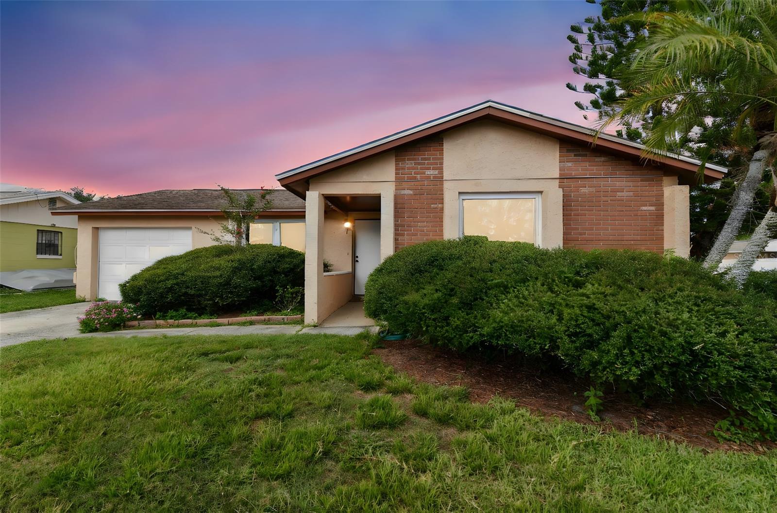 Investor special or perfect opportunity for a first-time buyer looking to add value! Located on a quiet cul-de-sac in the heart of Tampa, this 3-bedroom, 2-bathroom home with a 1-car garage offers 1,155 square feet of potential. The home features newer windows and an updated HVAC system, giving you a head start on improvements. With cosmetic updates, this property could truly shine. The fully fenced backyard includes a small storage shed and offers space to entertain or relax. Conveniently located near shopping, schools, and major highways, this home is a great opportunity to build equity and make it your own.