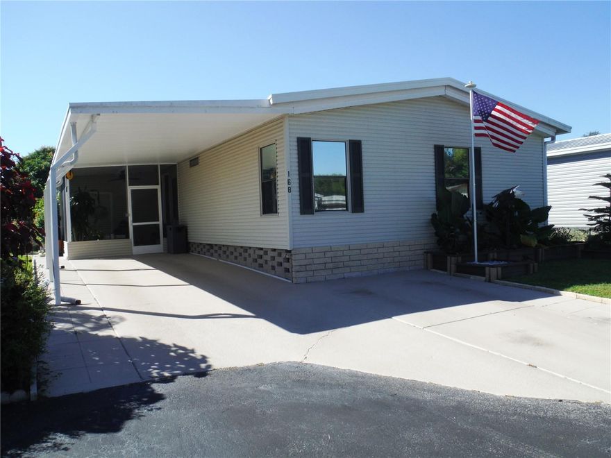 Phenomenal Property!  You have no idea how many upgrades have been done.  Sellers planned to stay here for the rest of their lives, but things have changed, so you have the benefits of all these abundant upgrades.  Very open great room plan with an island kitchen with quartz countertops, soft close draws, pullouts, appliances in the last 2 1/2 years along with cabinets and countertops, incredible built-in oven with microwave also built-in above it.  The fireplace in the living room is electric and can throw heat or just look lit for atmosphere. Remodeled baths with a bidet in the master with a heated seat and remote controls, master bath mirror with controls on the mirror, walk-in closets. Floors are luxury vinyl with unbelievable plush carpet in the bedrooms.  The 10X34 lanai and the backyard have automatic waterers for the lush plants.  There is also a hookup for a generator (the generator is negotiable).  Extra parking pad. This property is in the area that allows a cat or a dog up to 25 pounds. You own the 50X85 lot included in the price.  This is an unbelievable property and the price is incredibly low for it.   Measurements approximate.