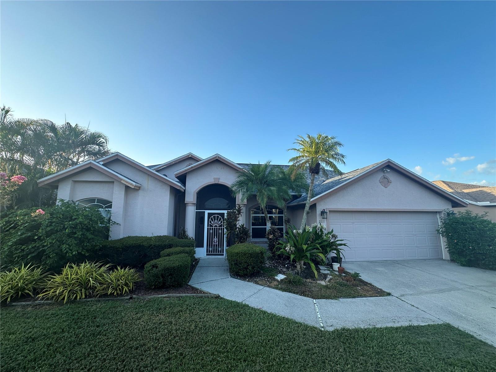 Amazing opportunity on this 3 bedroom 2 bath pool home with a brand new roof. This home is bright and spacious with high ceilings, tall windows and 3 sliders to access your covered lanai and screened pool. This home has a large living room as well as a large family room. The eat-in kitchen is open to the family room and has a butlers pantry with plenty of storage. The spacious primary suite has 2 walk-in closets and a large slider leading to the pool area. The spacious master bath has a garden tub, walk-in shower and vanity with double sinks. The 2 guest bedrooms have new flooring and share a bathroom with a double sink vanity. The large backyard is fenced with a partial pond view.
Creekwood is a great neighborhood with a community pool, tennis courts, and basketball court that has quick access to I-75. Conveniently located to Lakewood Ranch and Sarasota venues with everything one could want or need.